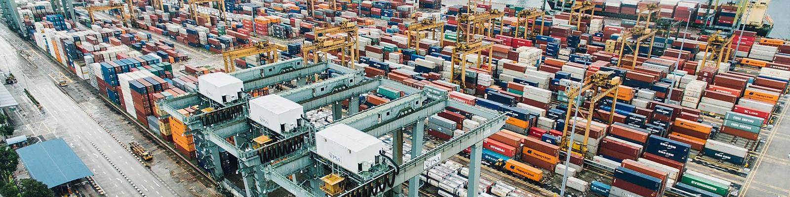 Stacked shipping containers at a port terminal